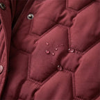 Briseida – Długi płaszcz puchowy z kapturem